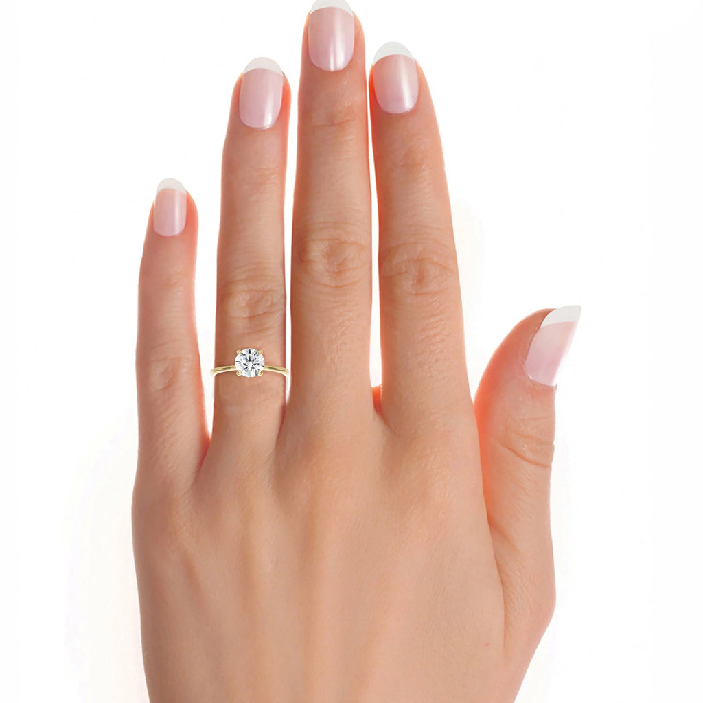 Classic Solitaire Engagement Ring in 14k Yellow Gold T272